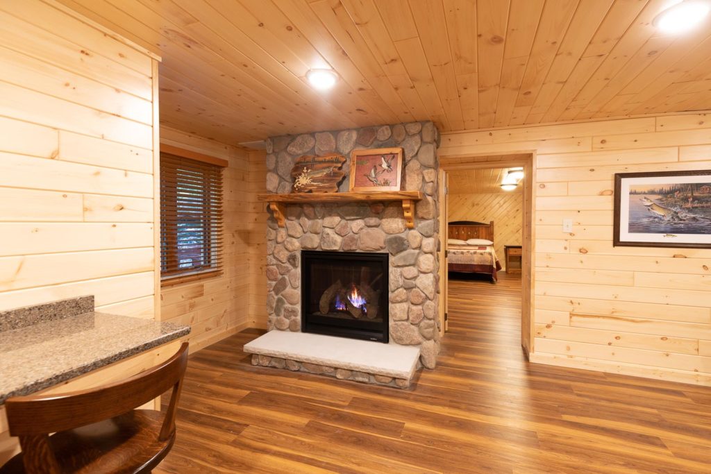 Spruce cabin fireplace and living room