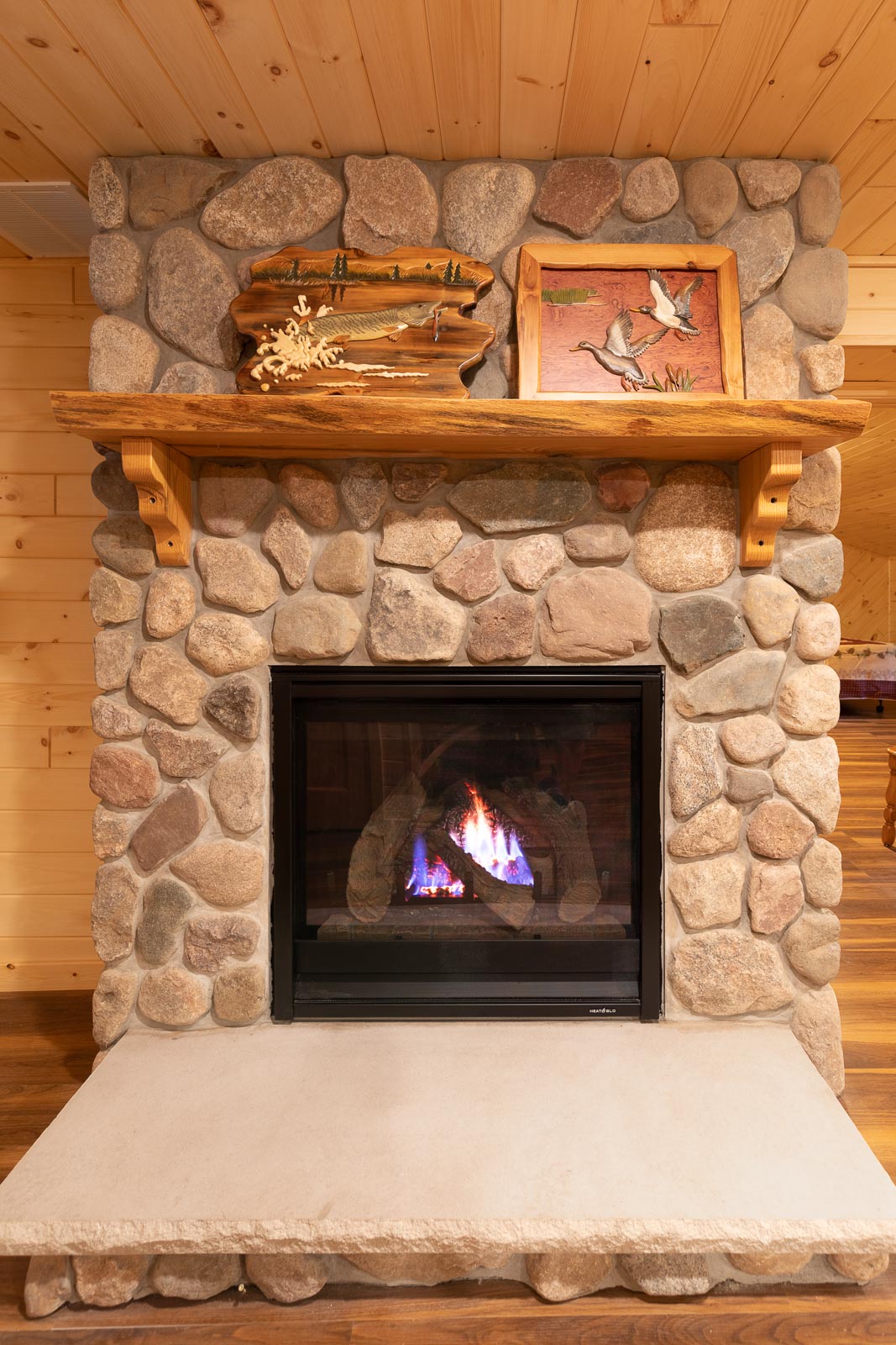 Spruce cabin fireplace